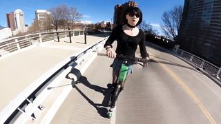 Brief micro-skirt on a scooter