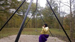 Wondrous Crossdresser at the park getting prepared to embark flapping on the sway in the park.