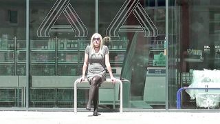 Crossdresser heads outdoors, City walk