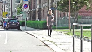 Crossdresser heads outdoors, City walk