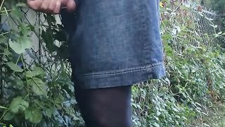 Crossdress outdoors urethral sounding. Jism on mini-skirt.