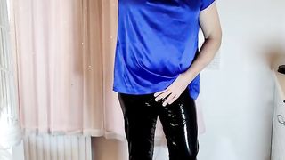 Uber-Sexy crossdresser satin half-top and vinyl stretch pants steaming
