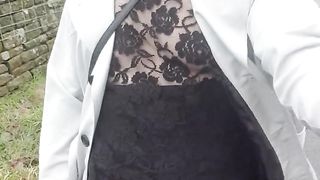 Crossdresser takes a walk on a windy lane