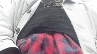 Crossdresser takes a walk on a windy lane