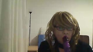 super-naughty COUGAR she-creature in front of the camera simulates a Suck Off while frolicking with a vibro