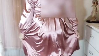 Ginger-Haired crossdresser Nottstvslut in antique satin.