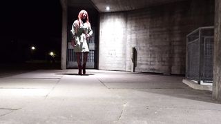 Crossdresser wears his stiffy cell and suspenders outdoors