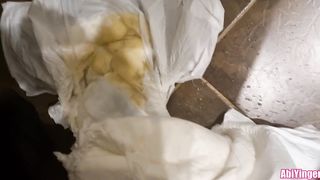 Trans Woman Pissing In Her Nappy and all Over the Floor