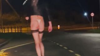 Sunny naked close to engaged road