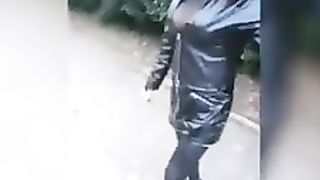 out of a sissy in PVC garment and wool coat