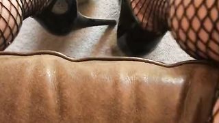 fishnets & high-heeled shoes close-up