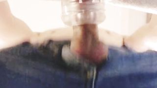 Femboy in denim cut-offs and sloppy soles pummels semi-transparent fleshlight