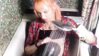 Wetlook in bathtub in microskirt, top and tights... Dousing clothes