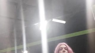 She-Male sitting on the teach station in stocking at night and waiting for the instruct