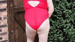 Hooded crossdresser superslut in the garden