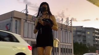 Public ambling with fishnet pantyhose and black sundress