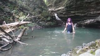 Alexa Cosmic t-model swimming at waterfall in t-shirt and t-t-shirt...