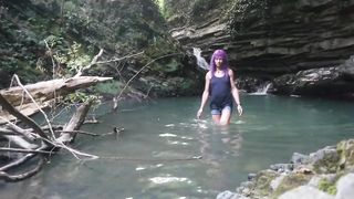 Alexa Cosmic t-model swimming at waterfall in t-shirt and t-t-shirt...
