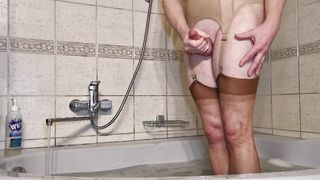 Sissy Cockslut chills out for a swift bedtime douche in her favourite bare underwear - Utter version