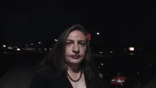 Sissy Mature CD out and about outdoors at night in a parking plenty of for demonstrating off.