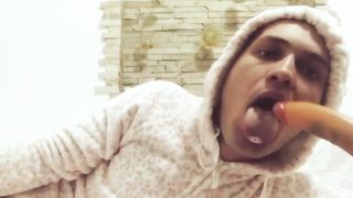 Sissy Stud in Jammies Gulps Fake Penis Deeply