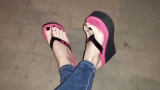 crossdresser in highly cool spin flops ambles the street