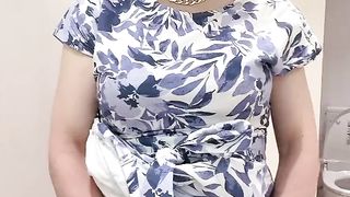 Matured cross dresser dressed in a platinum-blonde periwig and fapped in a rest bedroom