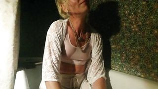 Raw in bathroom in white clothes and undergarments...