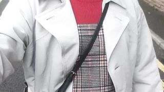 Crossdressing whore unveils her encaged hard-on on public street