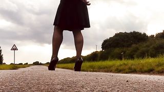 Crossdresser stilettos harness country walk about showcasing