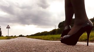 Crossdresser stilettos harness country walk about showcasing