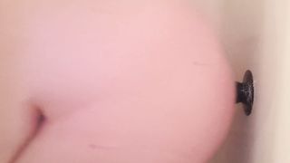 Trans stud uses faux-cock to plumb arse in douche