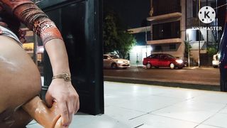 Will-Less sissy clitty dildoing her donk on the open door while vans pass by