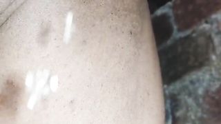 Sissy t-girl ambling bare at night and pee while in encaged and plugged