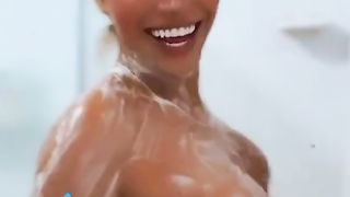 Young ladyboy in the douche