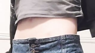 Trans Gurl She-Male adjusts cock-squeezing miniskirt