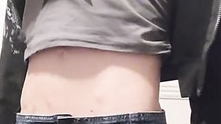 Trans Gurl She-Male adjusts cock-squeezing miniskirt