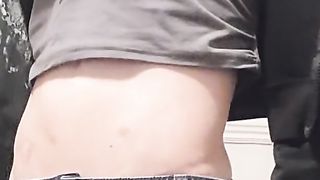 Trans Gurl She-Male adjusts cock-squeezing miniskirt