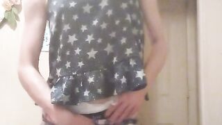 ladyboy sissy foolish millie wets her nappy and puts her pyjamas back on.