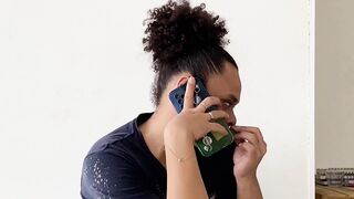 Tranny speaking from her smartphone