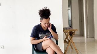 Tranny speaking from her smartphone