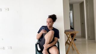 Tranny speaking from her smartphone