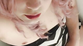 Crossdresser Juvia Jolie jacks her immense dick while she Looks at you with her pretty face