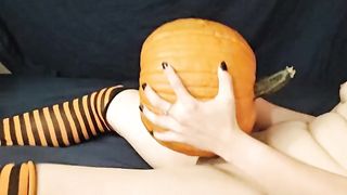 Tran's dame with fangs pulverizes pumpkin in hip highs