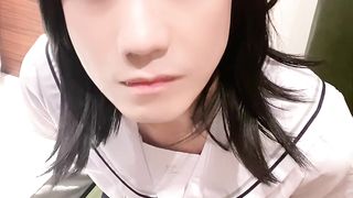 Japanese crossdresser in uniform stretches gams and faps