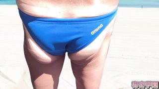 Why are beach volleyball bathing suits diminutive? I'm going to sing out