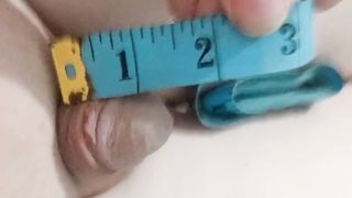 T-girl unwrapping and measuring puny hairless pink cigar