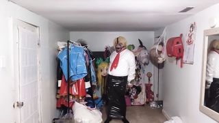 vinyl office Nymph Ball-gagged and Tied with assorted massagers in underpants