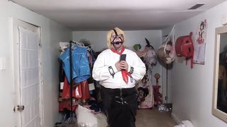 vinyl office Nymph Ball-gagged and Tied with assorted massagers in underpants