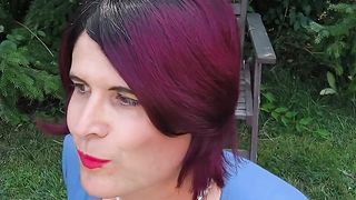 Blue sundress in the garden